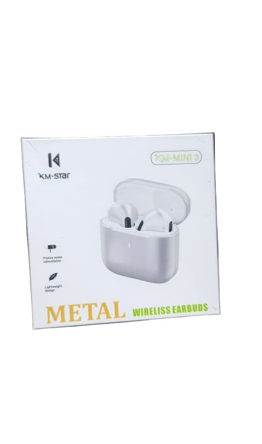K-Star metal wireless earbuds packaging held by a person in a store setting.